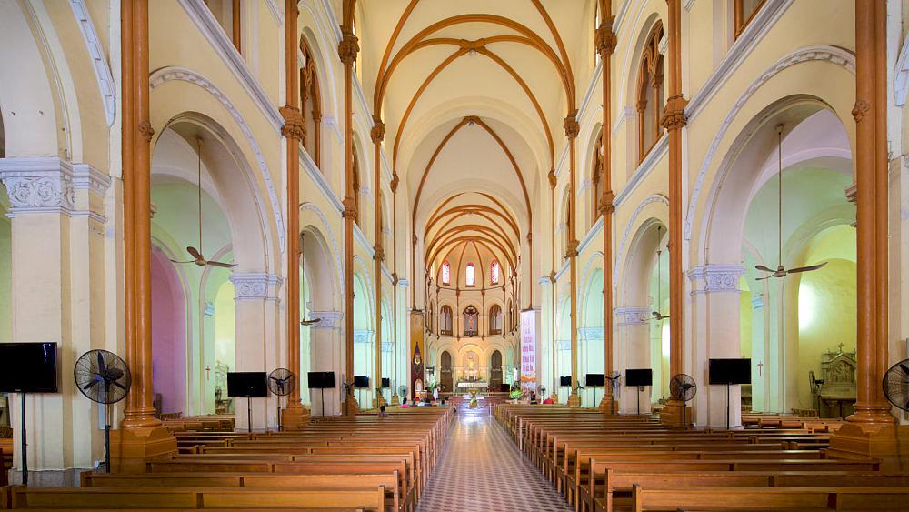 The church interior exudes solemnity, hosting weekly Mass while welcoming tourists to explore its sacred and peaceful atmosphere